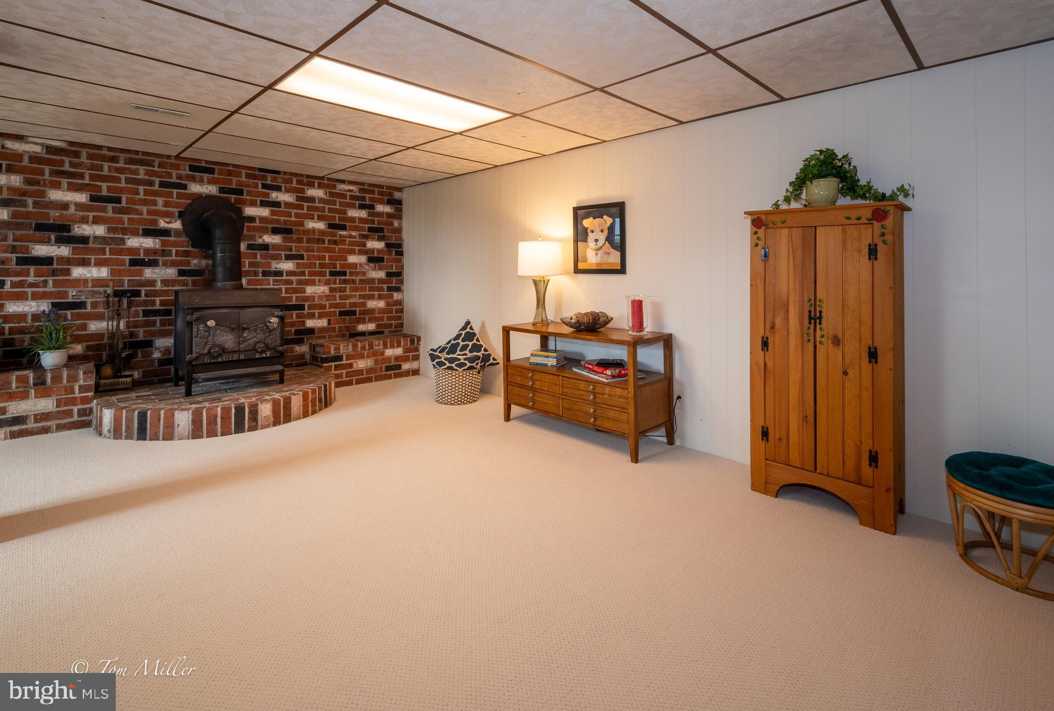 2539 Bert Fowler Road Hampstead, MD 21074 - Photo 38 of 65 Lower Level Family Room with Wood Burning Stove