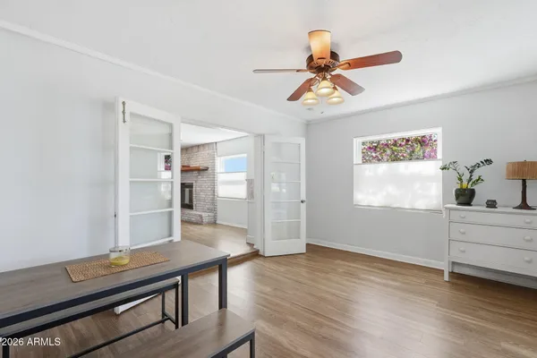 a workspace with furniture and window