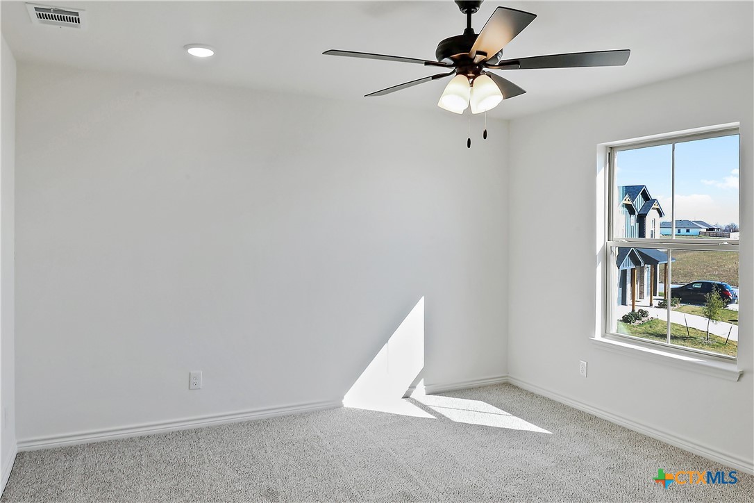 1408 Rita Blanca Court Temple, TX 76502 - Photo 12 of 17 a view of a room with window and a ceiling fan