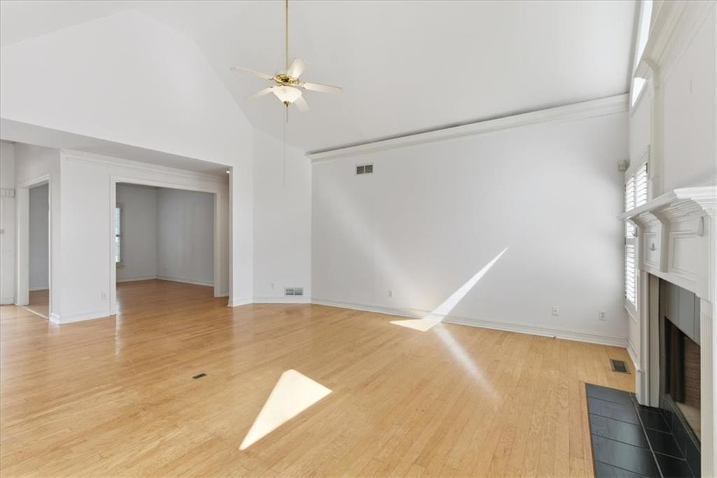 2021 Cockrell Pointe Northwest Kennesaw, GA 30152 - Photo 13 of 59 a view of an empty room with wooden floor