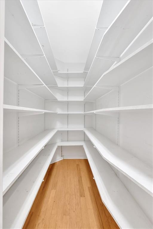 2021 Cockrell Pointe Northwest Kennesaw, GA 30152 - Photo 21 of 59 a view of a room with wooden floor
