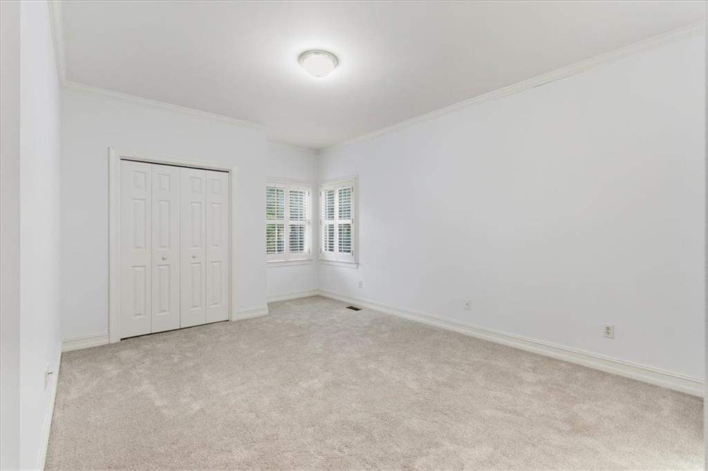 2021 Cockrell Pointe Northwest Kennesaw, GA 30152 - Photo 37 of 59 an empty room with windows
