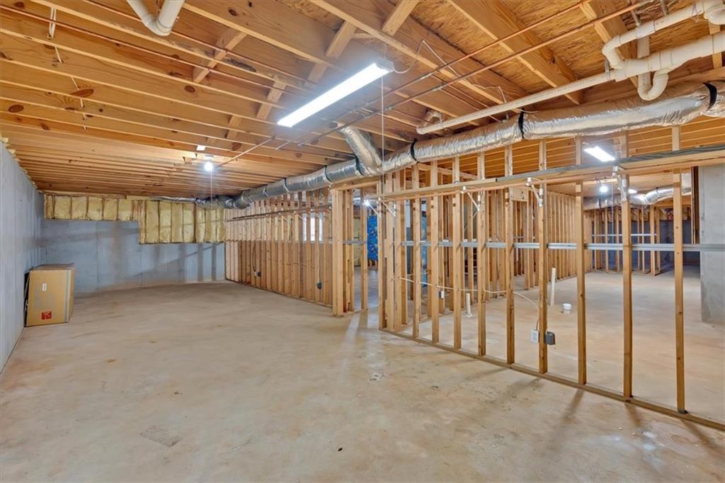 2021 Cockrell Pointe Northwest Kennesaw, GA 30152 - Photo 38 of 59 a view of empty room with wooden walls