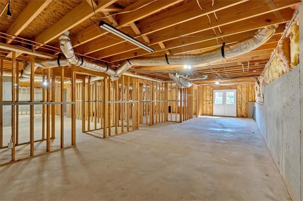 2021 Cockrell Pointe Northwest Kennesaw, GA 30152 - Photo 39 of 59 a view of an empty room with wooden walls