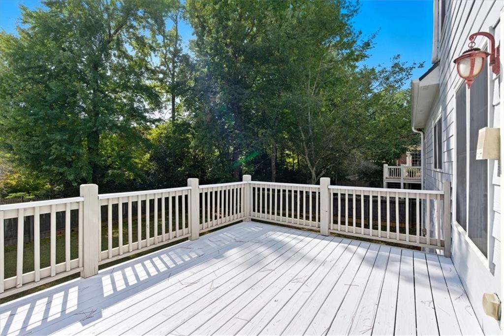 2021 Cockrell Pointe Northwest Kennesaw, GA 30152 - Photo 42 of 59 a view of deck with wooden floor and fence