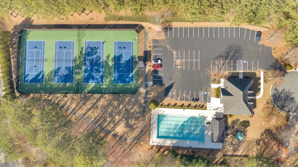 2021 Cockrell Pointe Northwest Kennesaw, GA 30152 - Photo 46 of 54 front view of a house with a yard