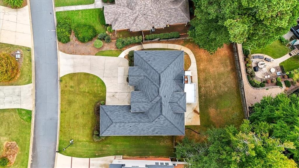 2021 Cockrell Pointe Northwest Kennesaw, GA 30152 - Photo 48 of 54 an aerial view of a house with a swimming pool