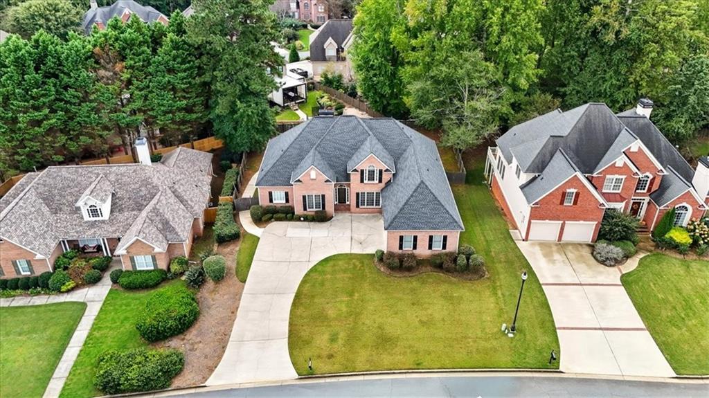 2021 Cockrell Pointe Northwest Kennesaw, GA 30152 - Photo 48 of 59 a aerial view of a house with swimming pool