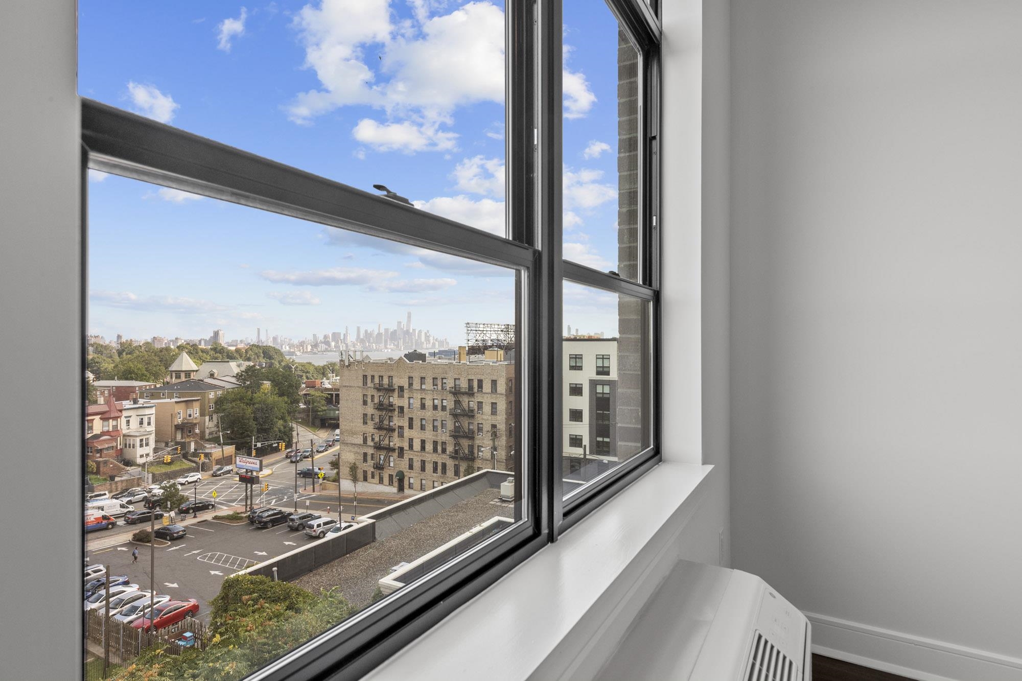 121 34th Street, Unit 604 Union City, NJ 07087 - Photo 10 of 44 a view of a balcony with city view
