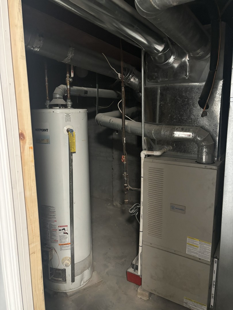 2049 East 93rd Street Chicago, IL 60617 - Photo 18 of 19 a view of storage and utility room