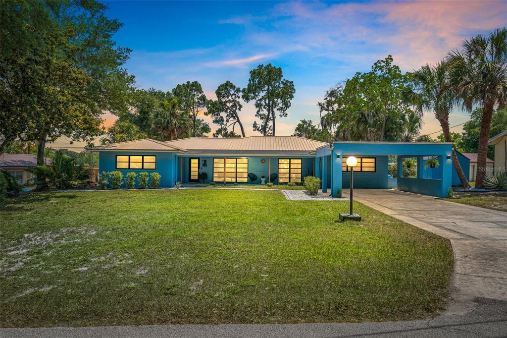 10 Madera Road DeBary, FL 32713 - Photo 1 of 1 a front view of a house with a garden