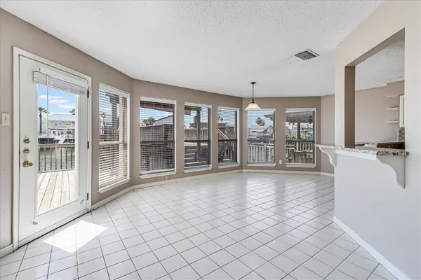 a kitchen with cabinets appliances and a sink