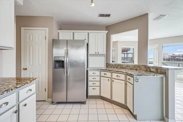 a bathroom with a toilet a sink and a mirror