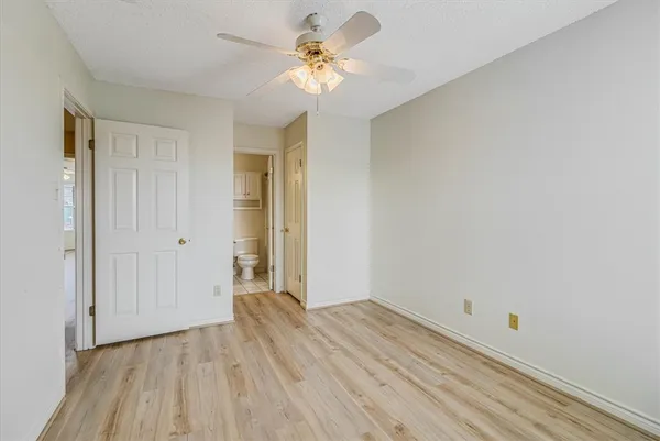 a bathroom with a sink toilet a shower and a mirror