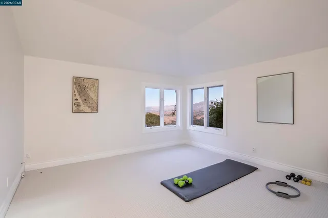 a workspace with furniture and window