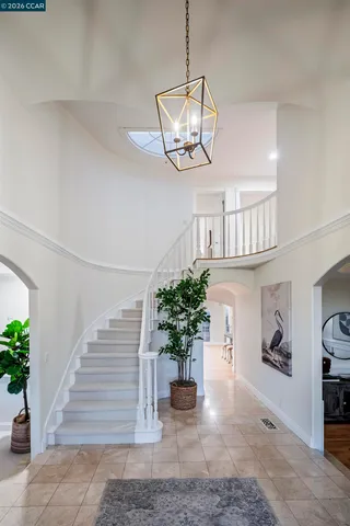 a view of a living room and hardwood floor