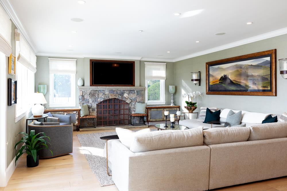 3917 Mainsail Place Soquel, CA 95073 - Photo 11 of 43 a living room with furniture a flat screen tv and a fireplace