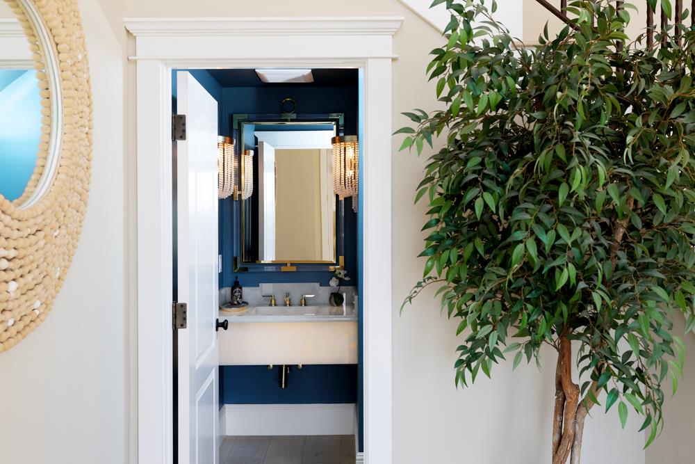 3917 Mainsail Place Soquel, CA 95073 - Photo 16 of 43 a bathroom with a sink and mirror