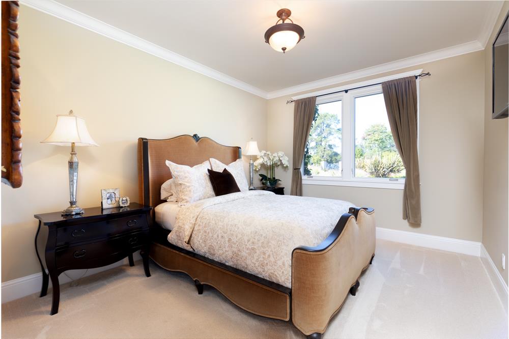 3917 Mainsail Place Soquel, CA 95073 - Photo 17 of 43 a large bed sitting in a bedroom next to a window