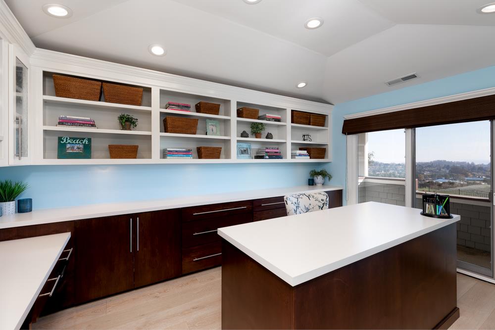 3917 Mainsail Place Soquel, CA 95073 - Photo 31 of 43 a kitchen with a table chairs cabinets and a window