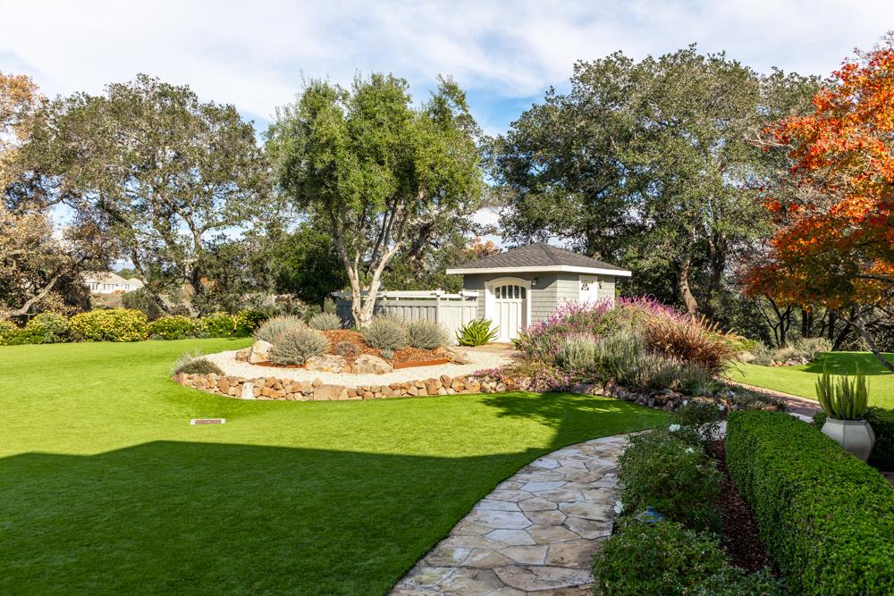 3917 Mainsail Place Soquel, CA 95073 - Photo 37 of 43 a front view of a house with a yard garage and outdoor seating