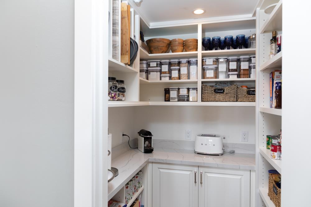 3917 Mainsail Place Soquel, CA 95073 - Photo 8 of 43 a view of a kitchen with fridge and rack