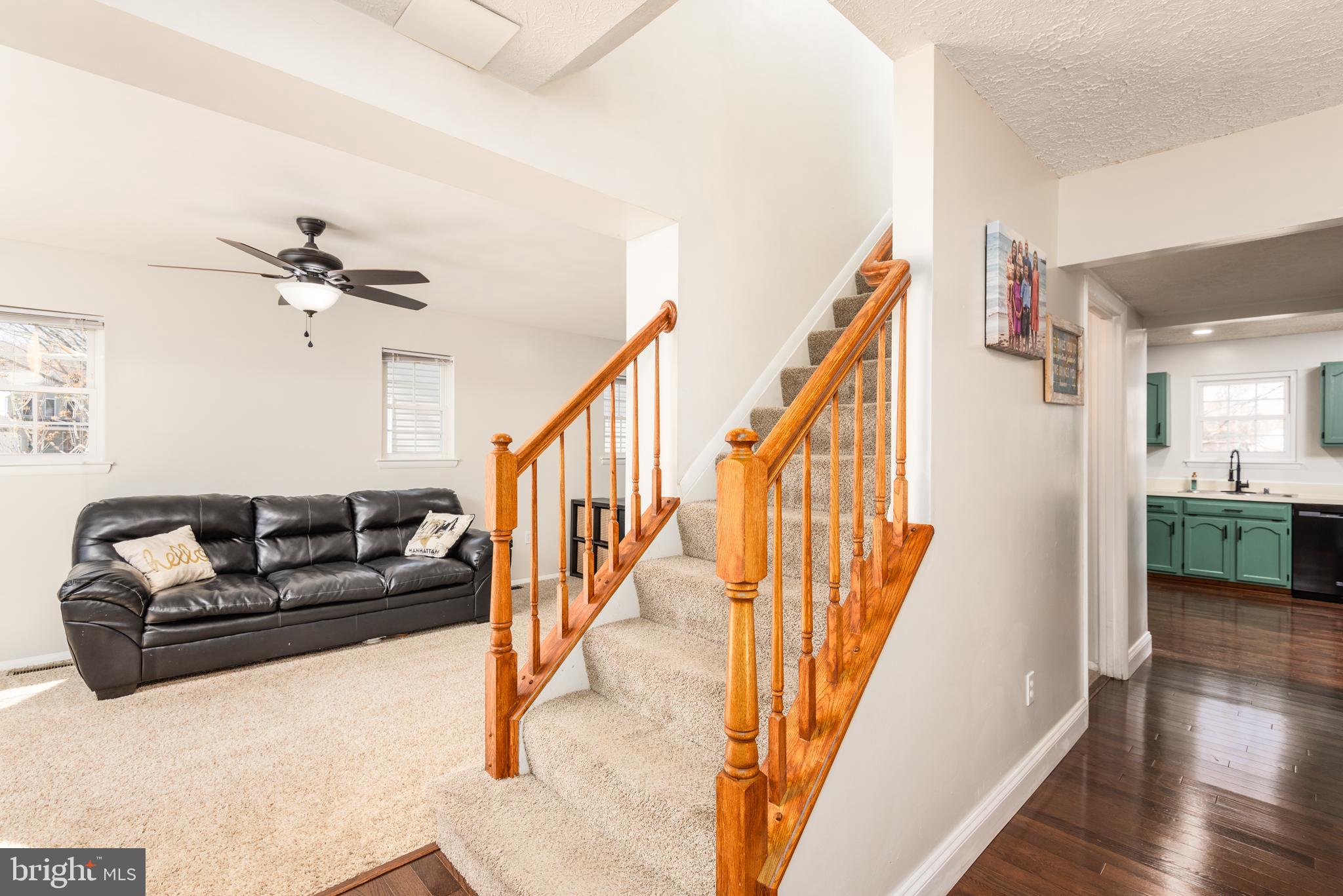 48 Fox Run Way Arnold, MD 21012 - Photo 20 of 33 a living room with wooden floor and stairs