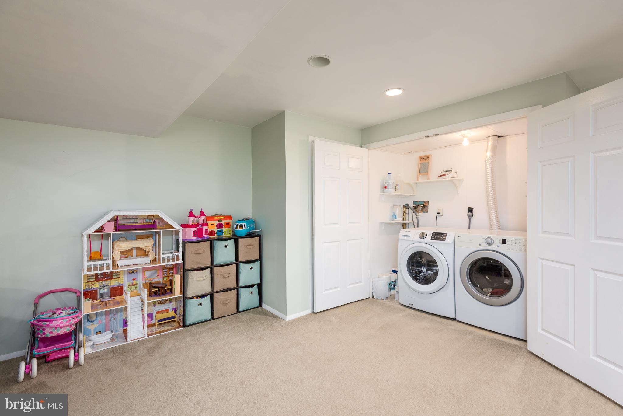 48 Fox Run Way Arnold, MD 21012 - Photo 27 of 33 a view of a storage & utility room with washer and dryer