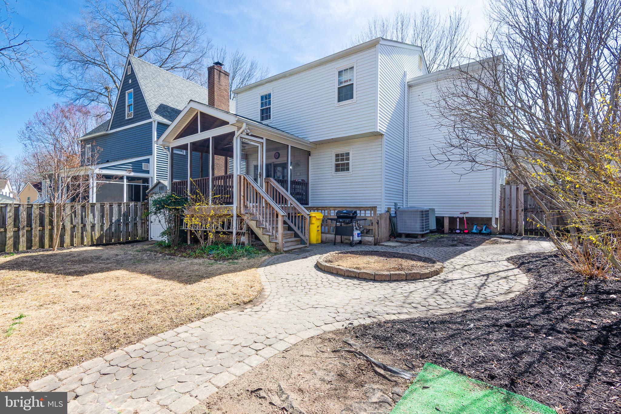 48 Fox Run Way Arnold, MD 21012 - Photo 3 of 33 a front view of a house with a yard and garage