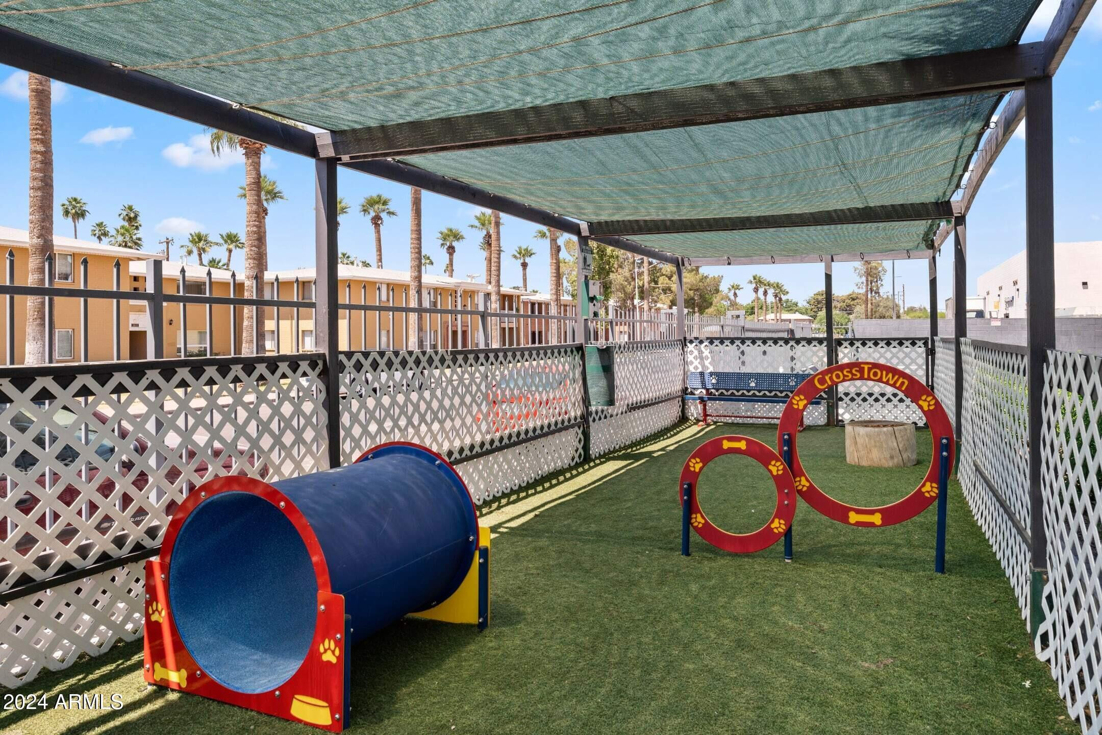 1601 West Camelback Road, Unit E10AE Phoenix, AZ 85015 - Photo 15 of 22 a view of a porch with furniture