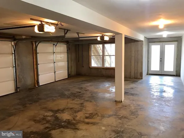 a view of empty room with windows