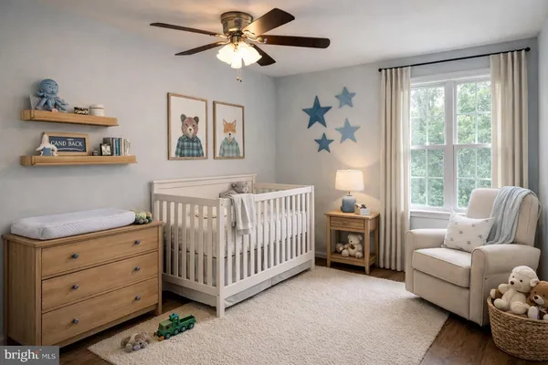 a bedroom with furniture and a window