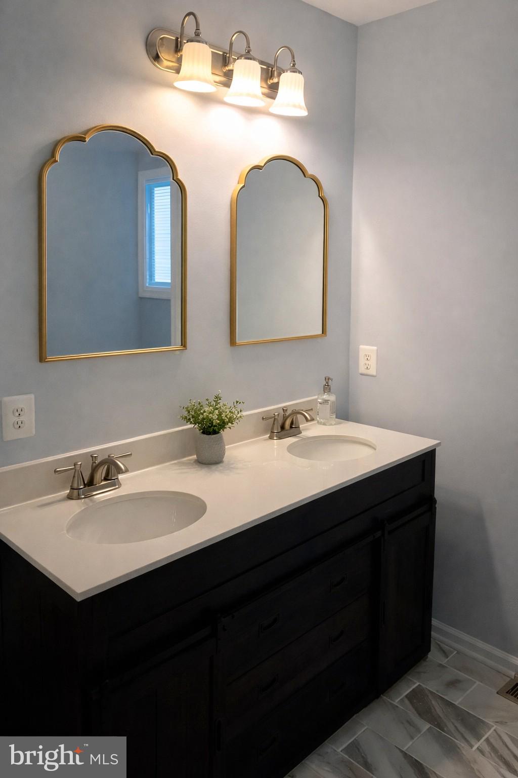 200 Colwood Drive Rileyville, VA 22650 - Photo 10 of 15 a bathroom with a double vanity sink and a mirror