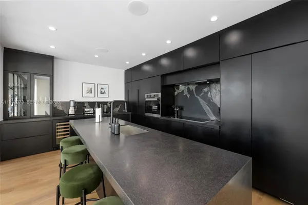 a lobby with furniture and a potted plant