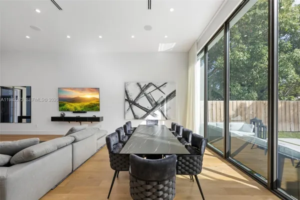 a view of a livingroom with furniture and window