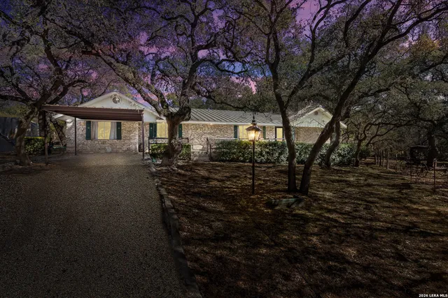 a house with trees in front of it