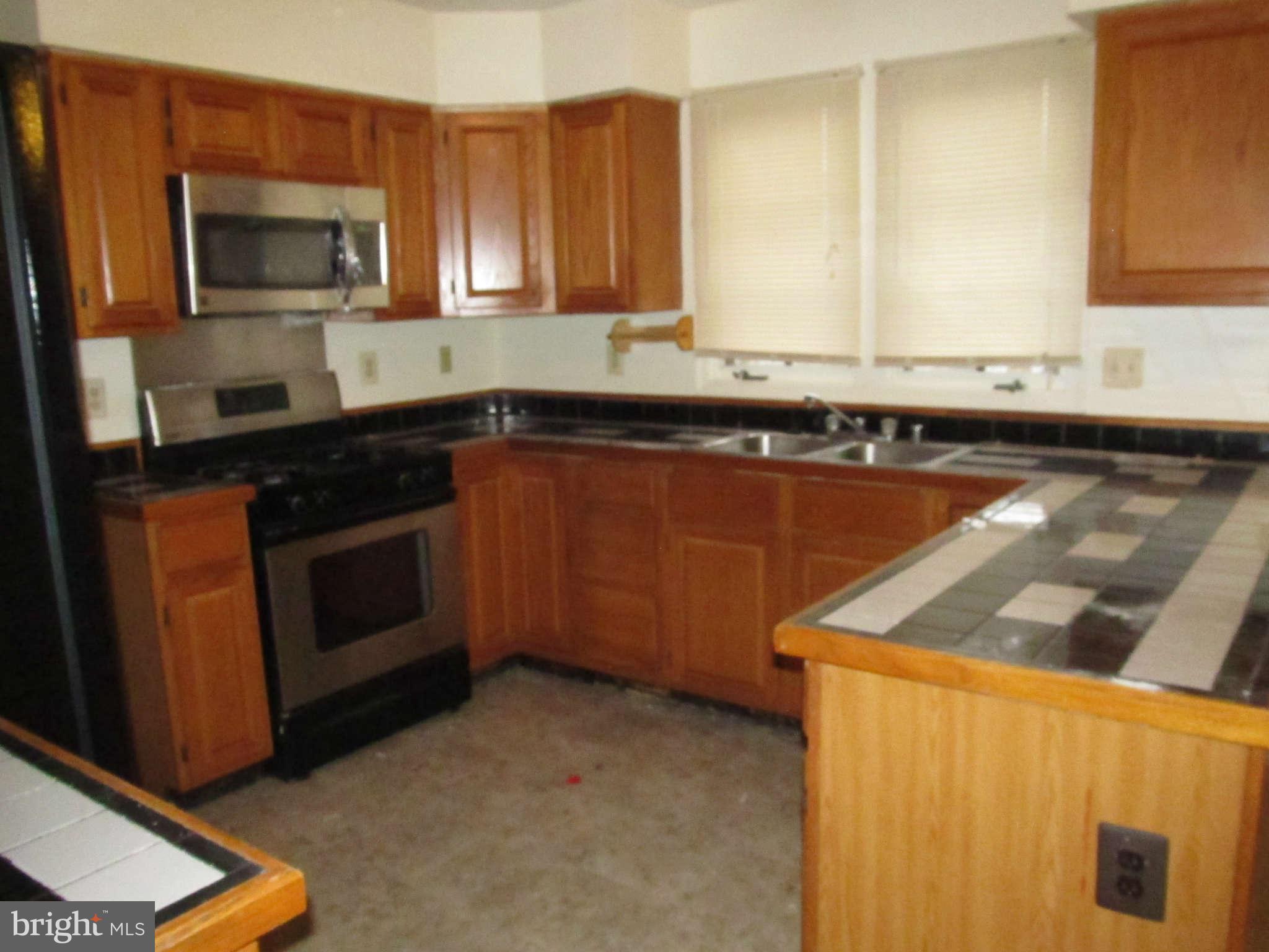 9302 Bluefield Road Springdale, MD 20721 - Photo 22 of 28 Kitchen