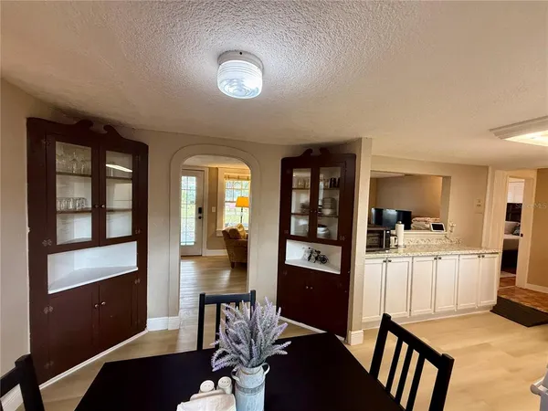 a view of a livingroom with furniture and windows