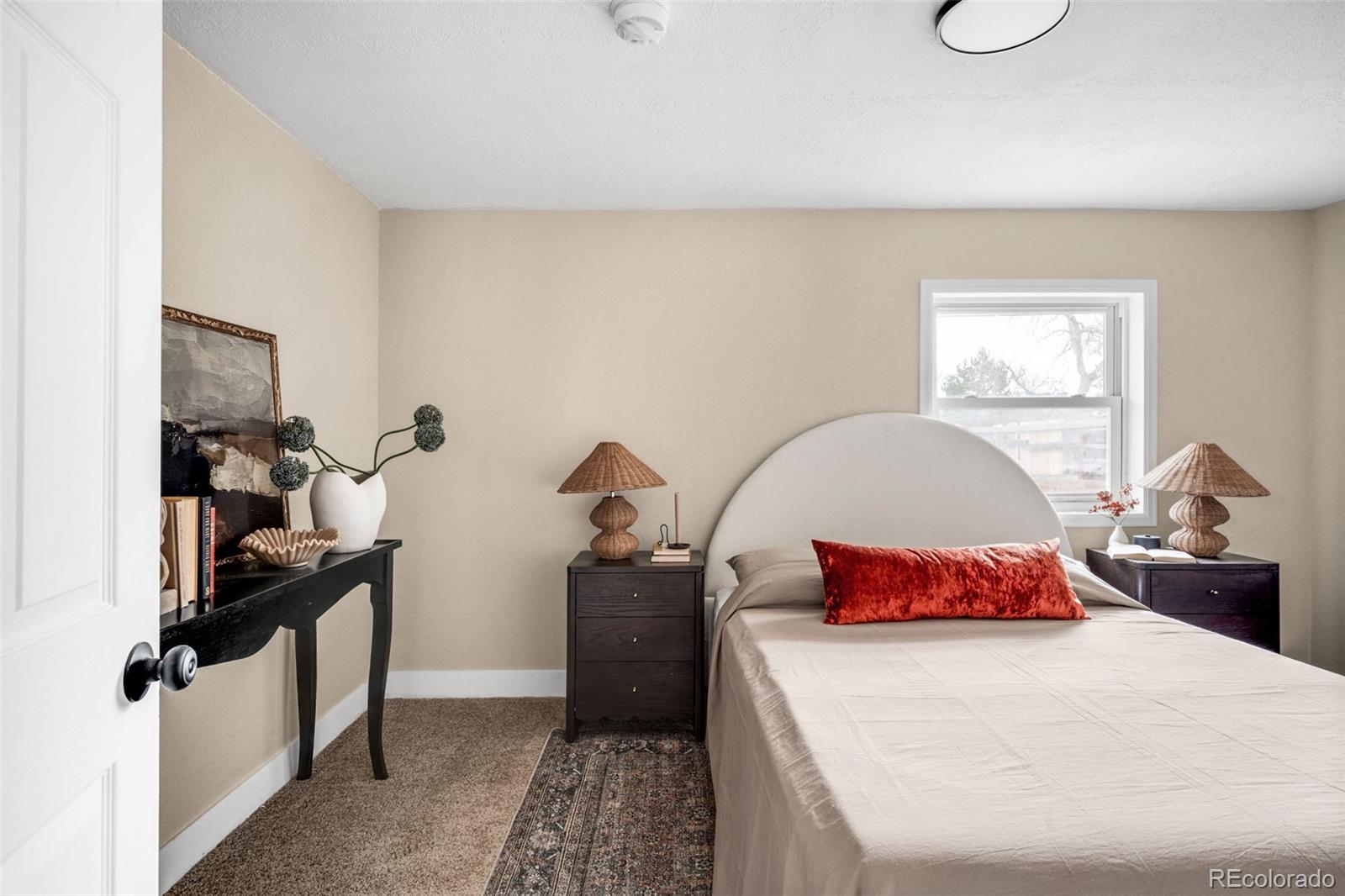 1900 Quebec Street Denver, CO 80220 - Photo 10 of 15 a bedroom with bed and window