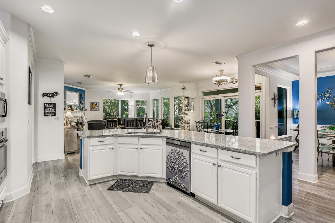 902 Rio Grande Loop Georgetown, TX 78633 - Photo 29 of 29 a kitchen with white cabinets and sink