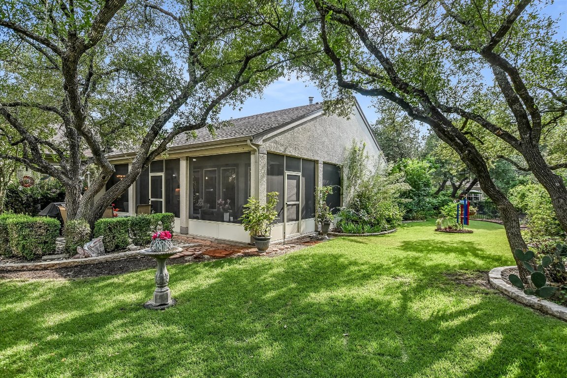 902 Rio Grande Loop Georgetown, TX 78633 - Photo 27 of 29 a front view of a house with a yard and porch