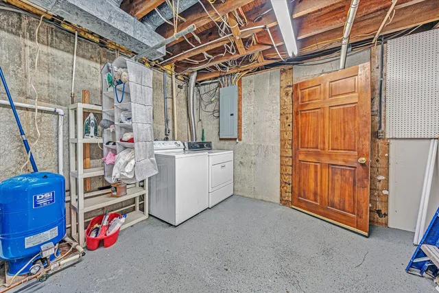 a backyard of a house with outdoor seating