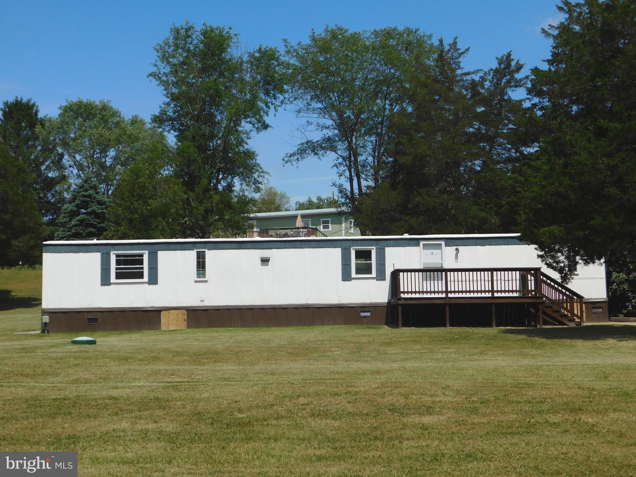 192 AA Rogers Road Augusta, WV 26704 - Photo 1 of 34 a view of a house with a swimming pool