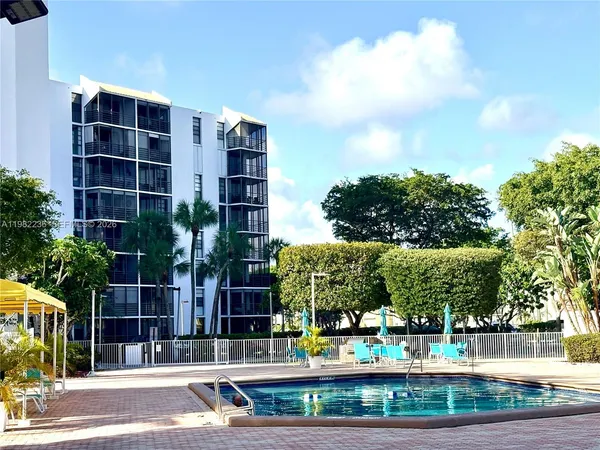 a building with trees in front of it