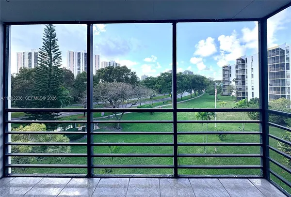 a view of a street from a balcony