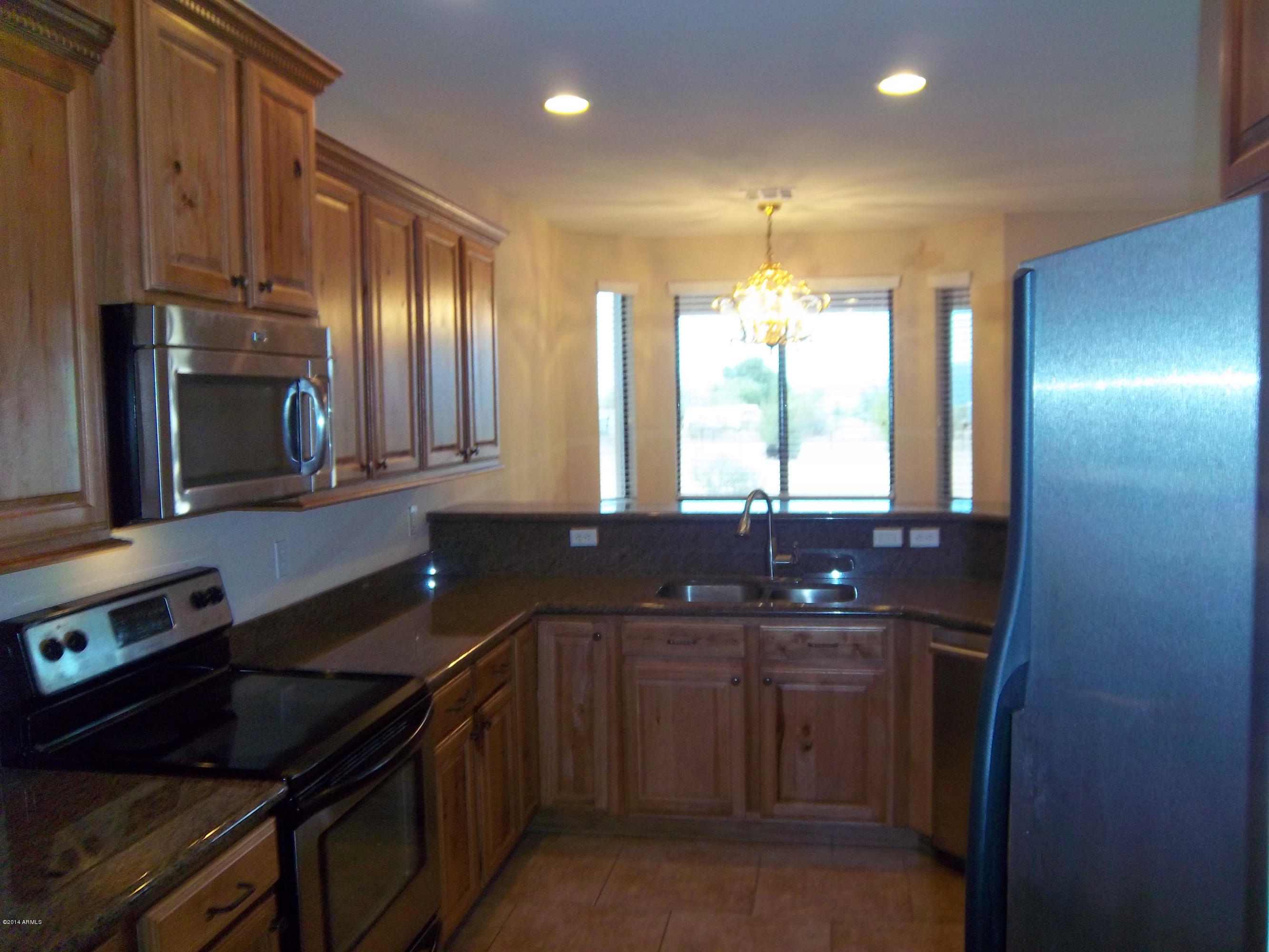 21117 West Steedridge Road Wittmann, AZ 85361 - Photo 13 of 66 Kitchen 1