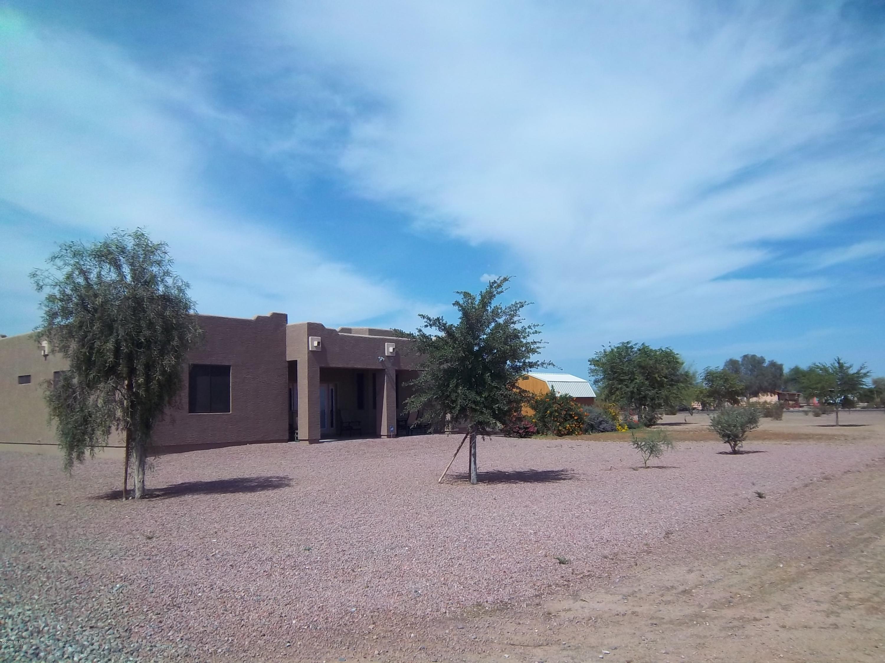 21117 West Steedridge Road Wittmann, AZ 85361 - Photo 25 of 66 Rear sheltered patio