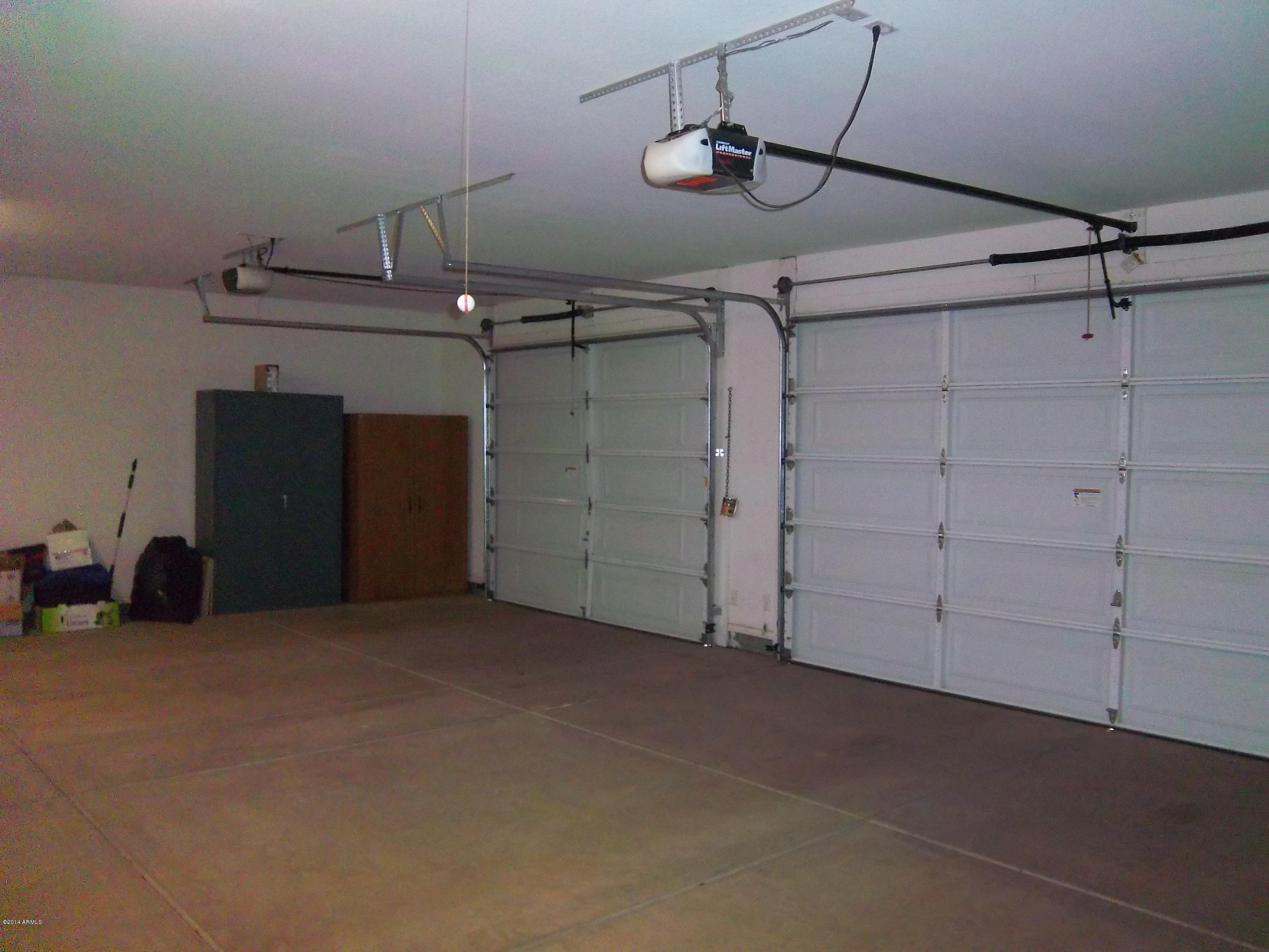 21117 West Steedridge Road Wittmann, AZ 85361 - Photo 32 of 66 Attached 3 car garage