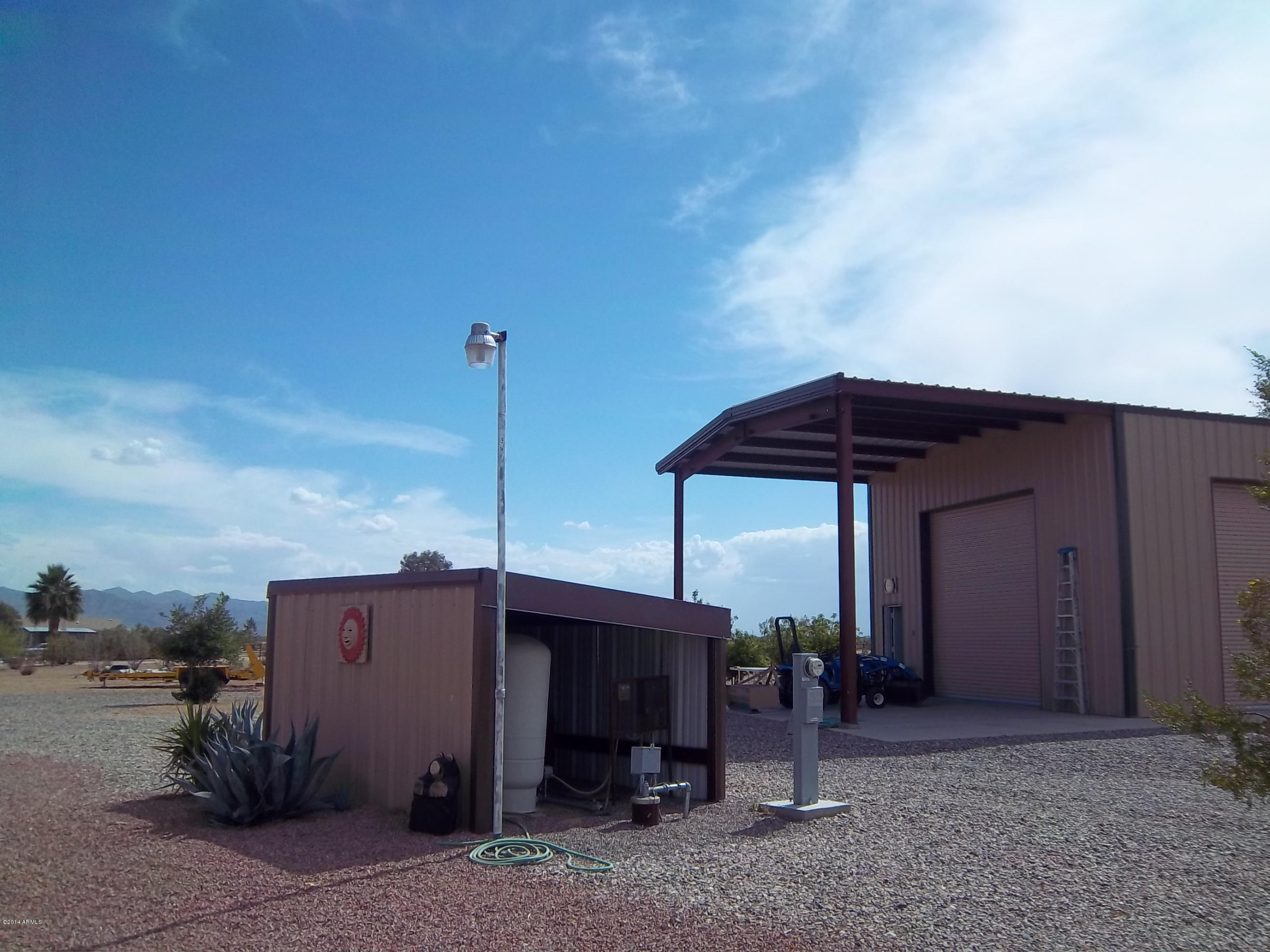 21117 West Steedridge Road Wittmann, AZ 85361 - Photo 35 of 66 Propane & utility shelter