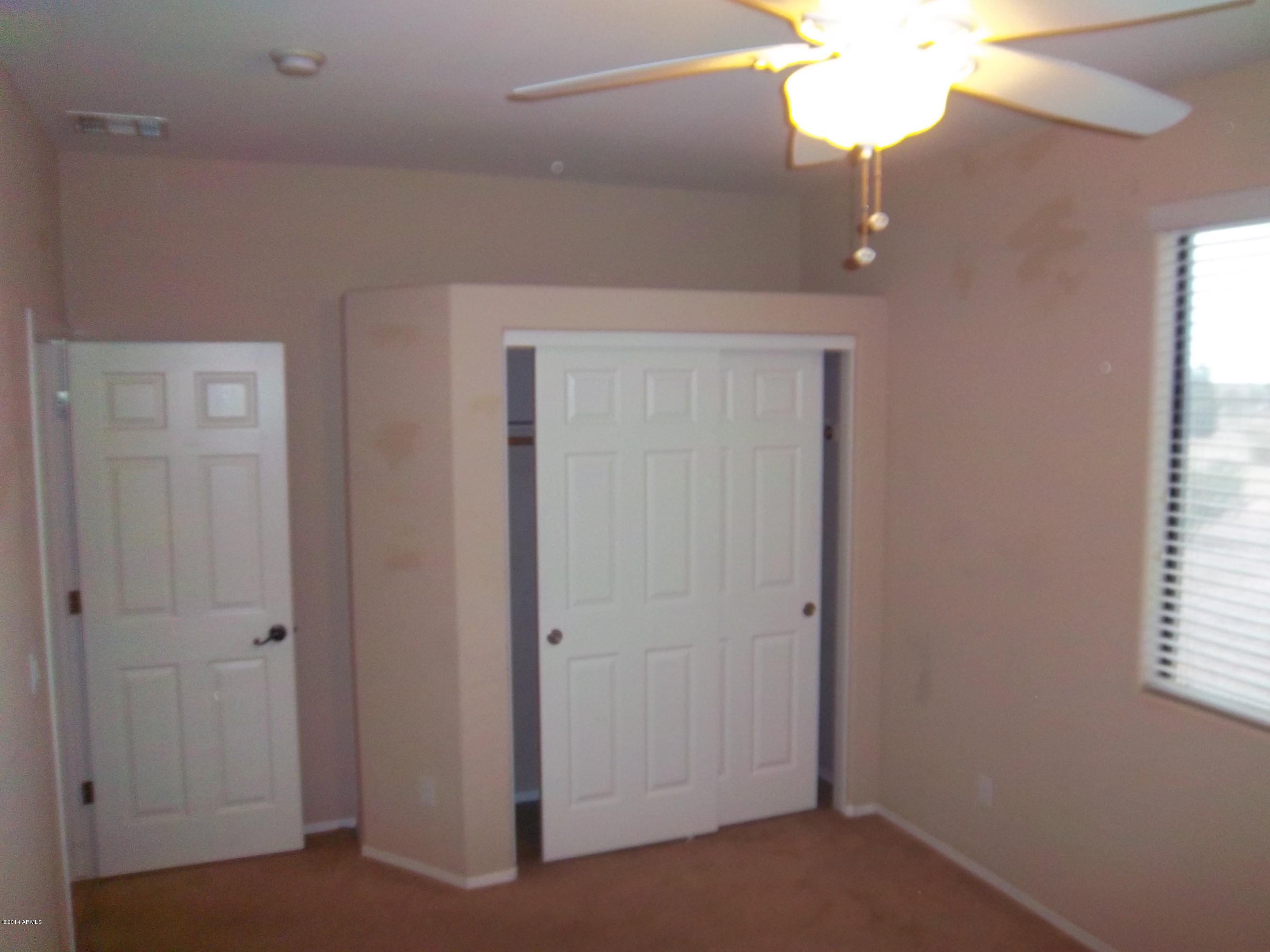 21117 West Steedridge Road Wittmann, AZ 85361 - Photo 58 of 66 Bedroom 4 closets